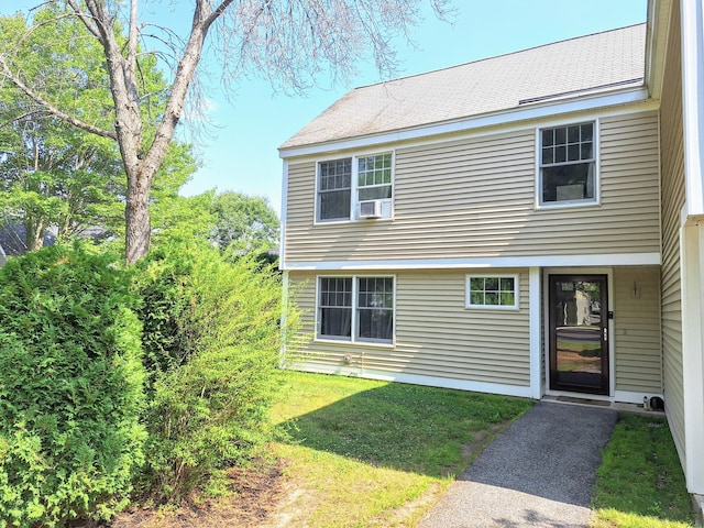 46 Glenridge Dr Unit 46, Portland, ME 04102 - colonial inspired home with a front lawn and cooling unit