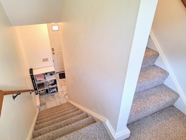 46 Glenridge Dr Unit 46, Portland, ME 04102 - staircase with baseboards and tile patterned flooring