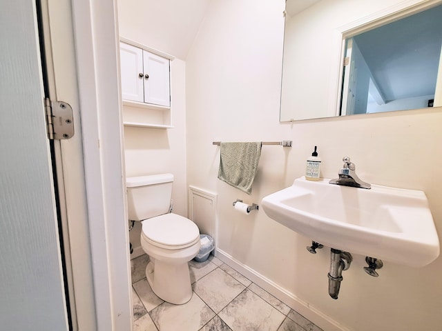 46 Glenridge Dr Unit 46, Portland, ME 04102 - bathroom with baseboards and marble finish flooring