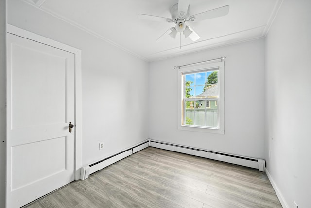 3 Gedney St, Augusta, ME 04330 - spare room with a baseboard heating unit, ornamental molding, ceiling fan, and light wood-style flooring
