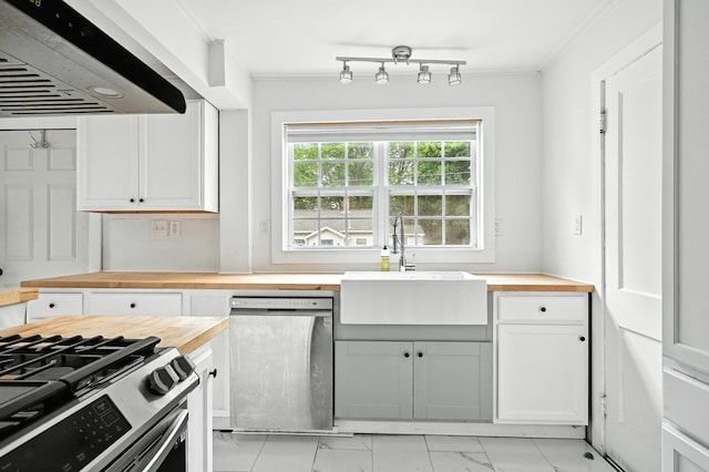 3 Gedney St, Augusta, ME 04330 - kitchen featuring butcher block countertops, stainless steel appliances, extractor fan, light marble finish flooring, and crown molding