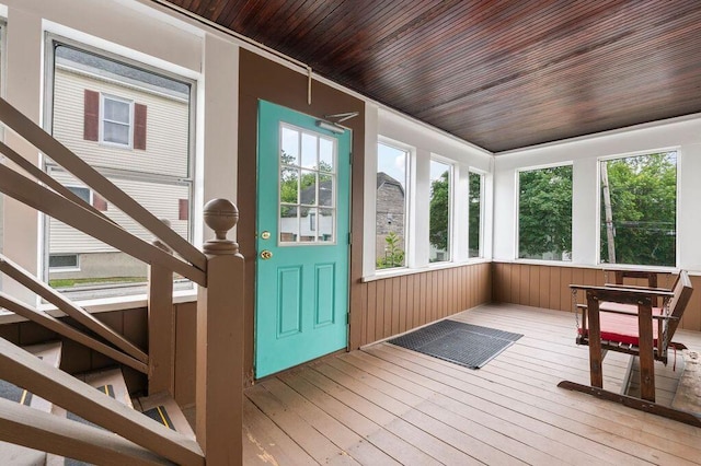 99 Hill St, Biddeford, ME 04005 - unfurnished sunroom with wood-type flooring and wooden ceiling