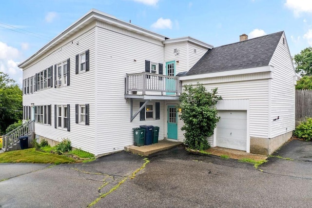 99 Hill St, Biddeford, ME 04005 - view of property with a garage and driveway
