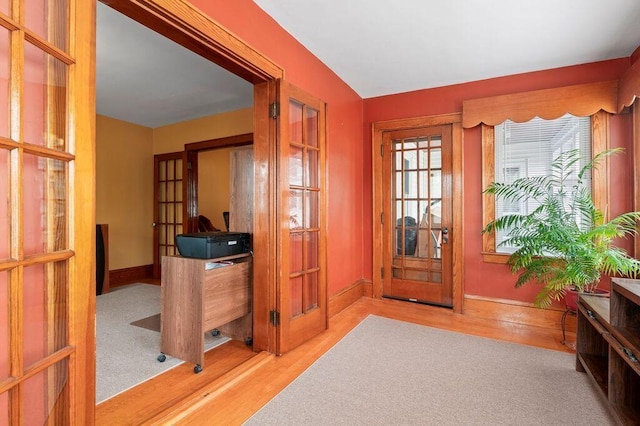 99 Hill St, Biddeford, ME 04005 - foyer entrance with french doors and wood finished floors