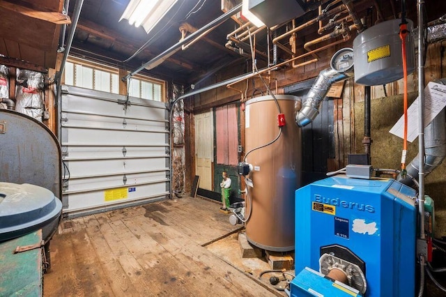 99 Hill St, Biddeford, ME 04005 - utility room featuring gas water heater, a heating unit, and a garage