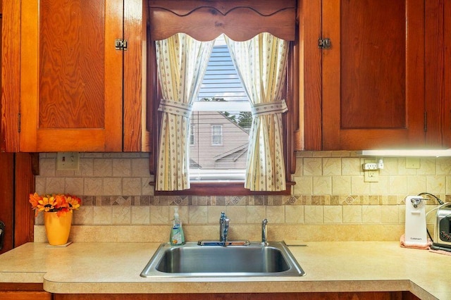 99 Hill St, Biddeford, ME 04005 - kitchen with light countertops and backsplash