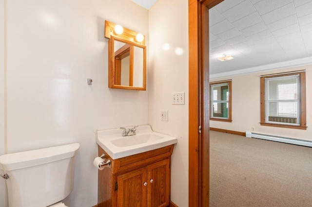 99 Hill St, Biddeford, ME 04005 - bathroom featuring vanity and baseboard heating