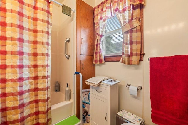 99 Hill St, Biddeford, ME 04005 - bathroom featuring shower / bath combo with shower curtain