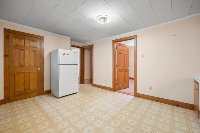 99 Hill St, Biddeford, ME 04005 - kitchen featuring freestanding refrigerator and ornamental molding