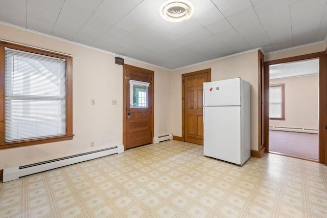 99 Hill St, Biddeford, ME 04005 - kitchen featuring freestanding refrigerator, a baseboard radiator, crown molding, and light floors