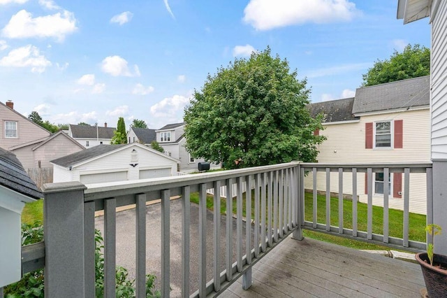 99 Hill St, Biddeford, ME 04005 - wooden deck featuring a residential view and a lawn