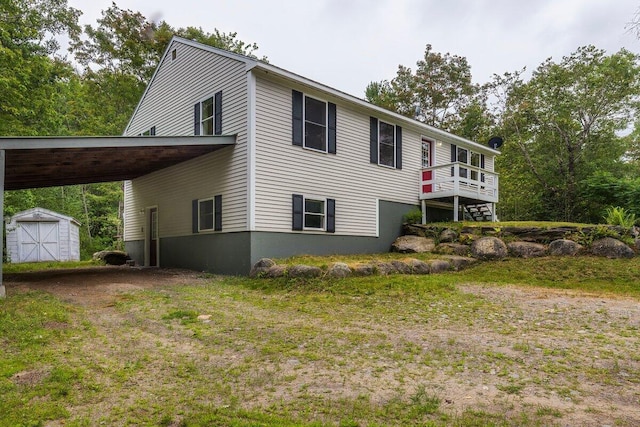 7 Lucas Ct, Bristol, ME 04539 - view of front of property with a shed, a carport, and driveway