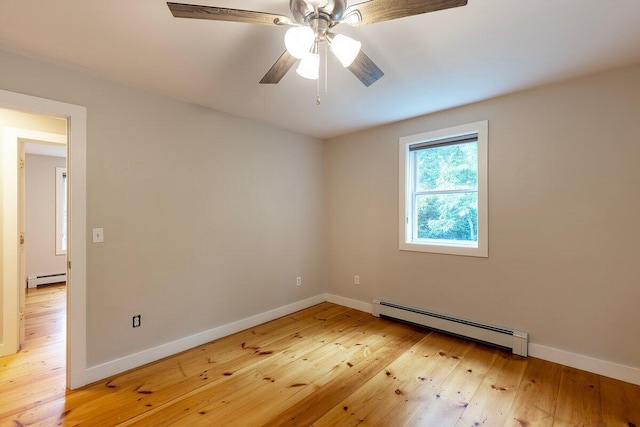 7 Lucas Ct, Bristol, ME 04539 - empty room with a baseboard radiator, light wood finished floors, a baseboard heating unit, and a ceiling fan
