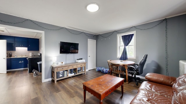 28 Stewart St, Lewiston, ME 04240 - living room featuring dark wood-style floors and baseboards