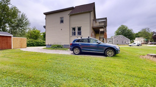 28 Stewart St, Lewiston, ME 04240 - view of side of home with a lawn