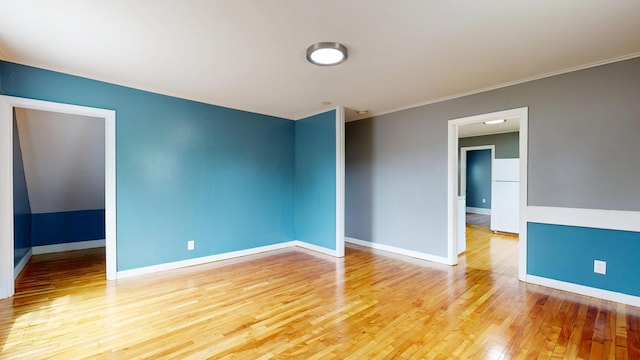 28 Stewart St, Lewiston, ME 04240 - unfurnished room featuring light wood-type flooring and crown molding