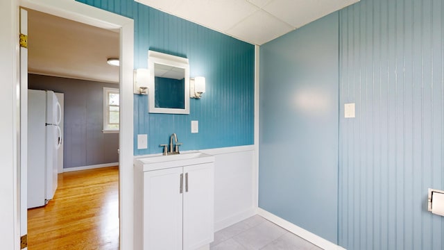 28 Stewart St, Lewiston, ME 04240 - bathroom featuring vanity and wood finished floors