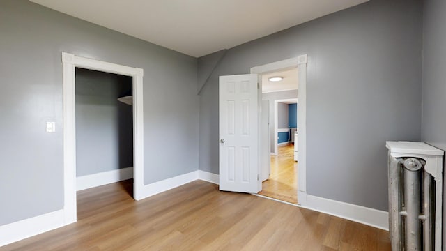 28 Stewart St, Lewiston, ME 04240 - unfurnished bedroom featuring light wood-style floors and baseboards