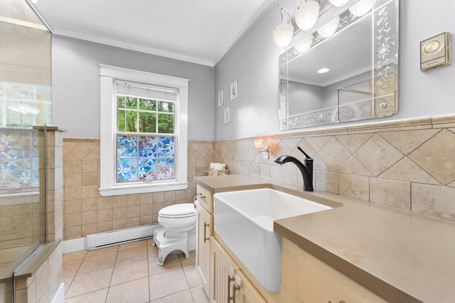 118 Gore Rd, Palermo, ME 04354 - bathroom featuring tile walls, vanity, baseboard heating, tile patterned flooring, and crown molding
