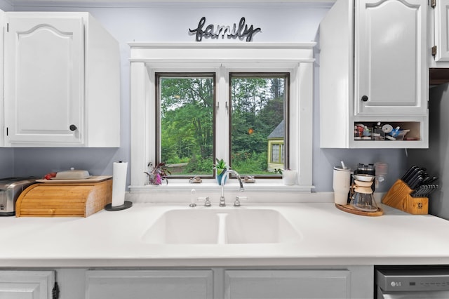 118 Gore Rd, Palermo, ME 04354 - kitchen featuring white cabinets, light countertops, and stainless steel dishwasher