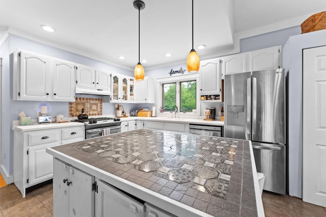 118 Gore Rd, Palermo, ME 04354 - kitchen featuring stainless steel appliances, white cabinets, hanging light fixtures, tile patterned floors, and recessed lighting