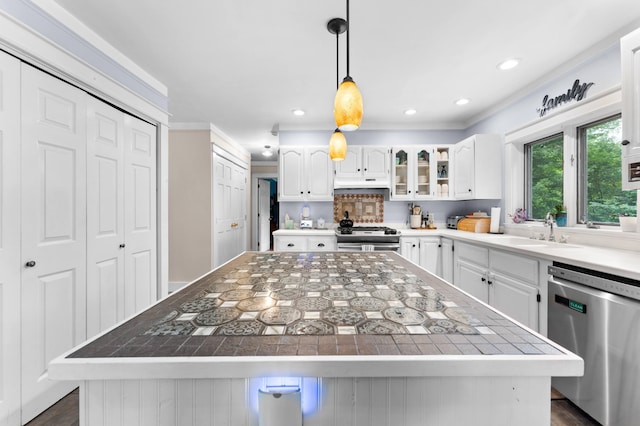 118 Gore Rd, Palermo, ME 04354 - kitchen featuring dishwasher, crown molding, white cabinets, a center island, and decorative light fixtures