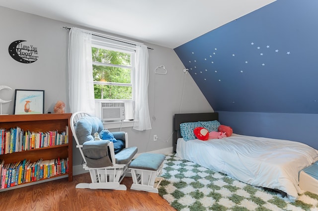 118 Gore Rd, Palermo, ME 04354 - bedroom featuring wood finished floors, vaulted ceiling, and cooling unit