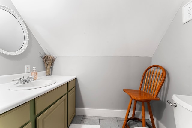 118 Gore Rd, Palermo, ME 04354 - bathroom with vanity, tile patterned flooring, and vaulted ceiling
