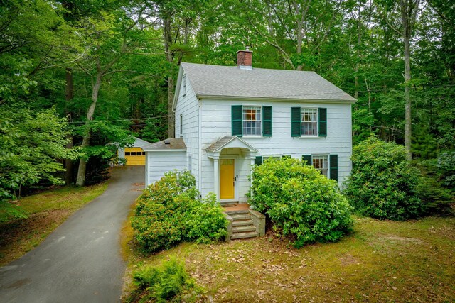 135 State Highway 3, Bar Harbor, ME 04609 - colonial house with a chimney, a shingled roof, and a wooded view