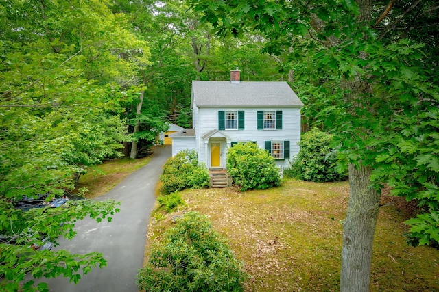 135 State Highway 3, Bar Harbor, ME 04609 - colonial-style house with a chimney and asphalt driveway