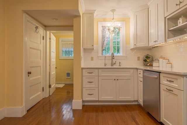 135 State Highway 3, Bar Harbor, ME 04609 - kitchen featuring a chandelier, dishwasher, wood finished floors, decorative backsplash, and white cabinets