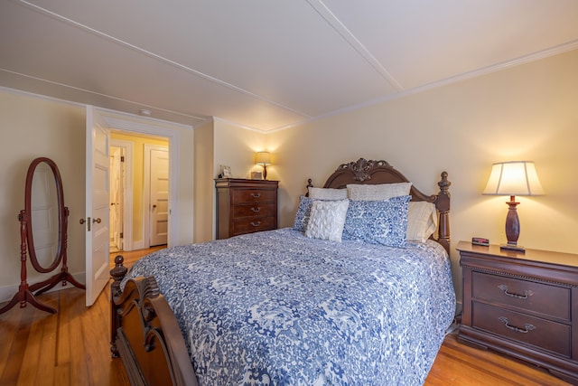 135 State Highway 3, Bar Harbor, ME 04609 - bedroom with light wood-style floors and crown molding