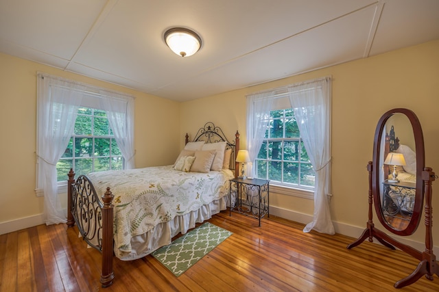 135 State Highway 3, Bar Harbor, ME 04609 - bedroom featuring hardwood / wood-style flooring and multiple windows