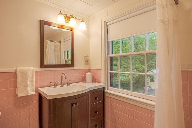 135 State Highway 3, Bar Harbor, ME 04609 - full bath with tile walls, plenty of natural light, vanity, a wainscoted wall, and crown molding