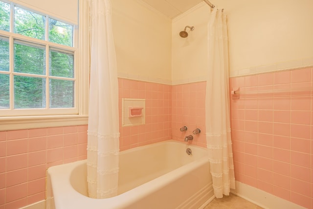 135 State Highway 3, Bar Harbor, ME 04609 - bathroom featuring tile walls, healthy amount of natural light, shower / bath combination with curtain, tile patterned floors, and ornamental molding