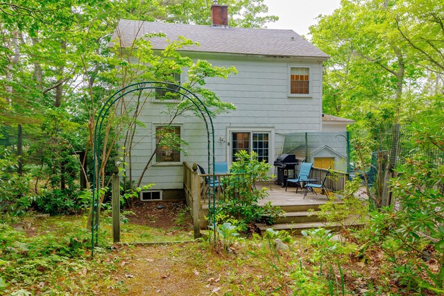135 State Highway 3, Bar Harbor, ME 04609 - back of property featuring a chimney, a deck, and roof with shingles