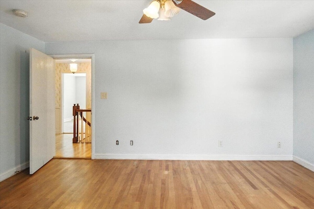 49 Bardwell St, Lewiston, ME 04240 - empty room featuring light wood finished floors and ceiling fan