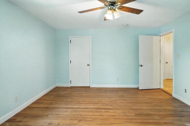 49 Bardwell St, Lewiston, ME 04240 - unfurnished bedroom with wood finished floors and ceiling fan
