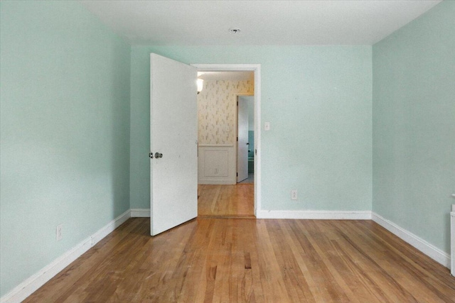 49 Bardwell St, Lewiston, ME 04240 - unfurnished room with wood finished floors and baseboards