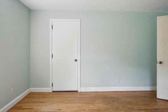 49 Bardwell St, Lewiston, ME 04240 - empty room with light wood-style flooring