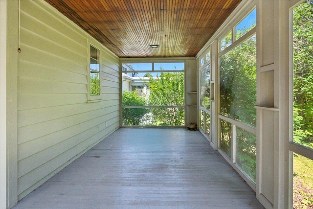 49 Bardwell St, Lewiston, ME 04240 - unfurnished sunroom with wood ceiling, wooden walls, and wood finished floors