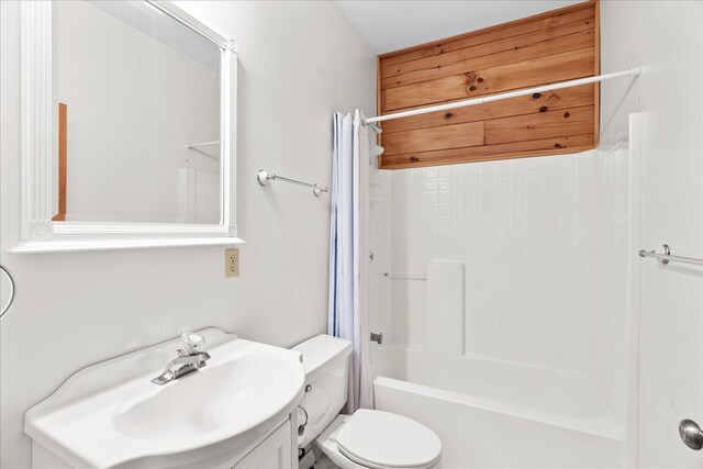 3691 Flagpole Rd, Ellijay, GA 30540 - full bathroom with toilet, shower / bath combination with curtain, and vanity