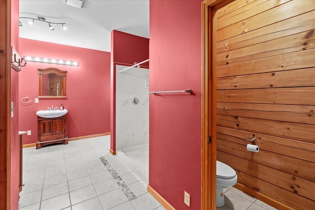 3691 Flagpole Rd, Ellijay, GA 30540 - bathroom with a shower stall, tile patterned floors, toilet, vanity, and baseboards