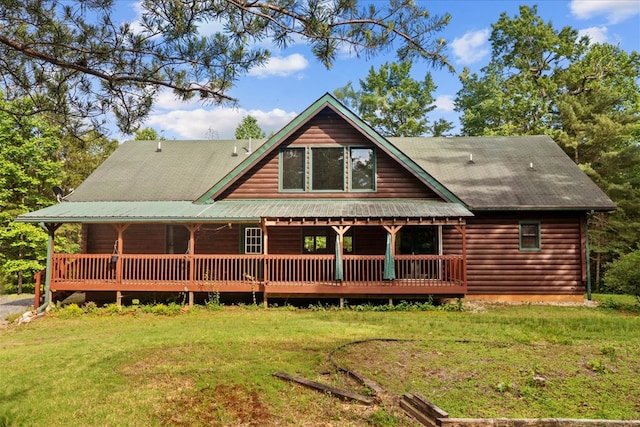 3691 Flagpole Rd, Ellijay, GA 30540 - rear view of house featuring a lawn and covered porch
