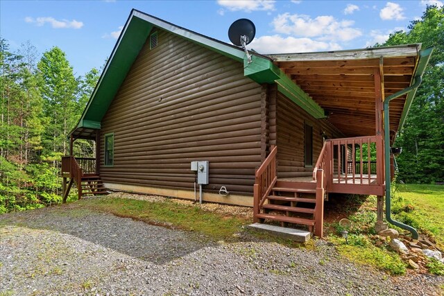 3691 Flagpole Rd, Ellijay, GA 30540 - view of home's exterior with stairs, a wooden deck, and log exterior