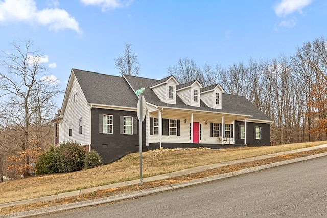 cape cod-style house with brick siding, roof with shingles, crawl space, a porch, and a front yard