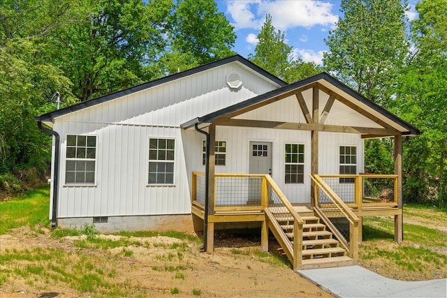 modern inspired farmhouse featuring crawl space and a wooden deck