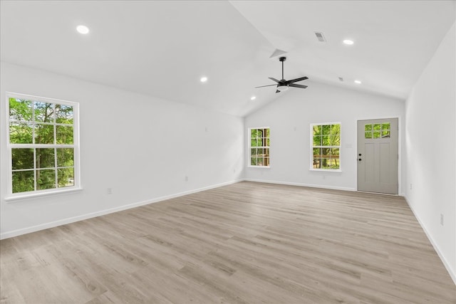 unfurnished living room with baseboards, lofted ceiling, recessed lighting, and visible vents