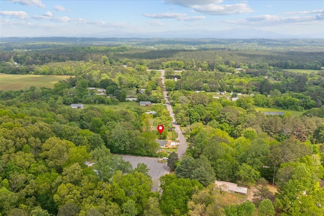 aerial view with a wooded view