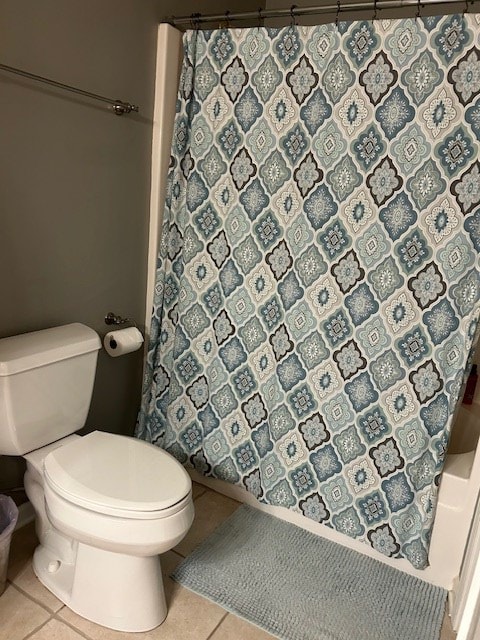 1698 Pin Oak Dr Unit 128, Dalton, GA 30721 - bathroom featuring tile patterned floors, toilet, and curtained shower